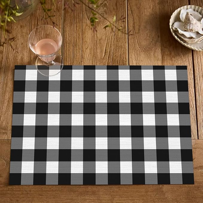 Artoid Mode Buffalo Plaid Vinyl Placemats Set of 4, 12x18 Inch Washable Non-Slip Heat Resistant Plastic Place Mats for Party Dining Table, Black/White