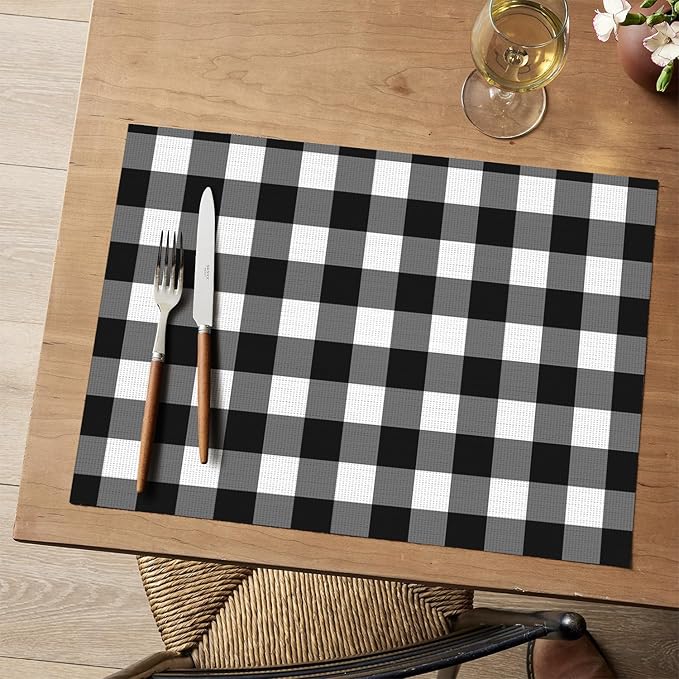 Artoid Mode Buffalo Plaid Vinyl Placemats Set of 4, 12x18 Inch Washable Non-Slip Heat Resistant Plastic Place Mats for Party Dining Table, Black/White