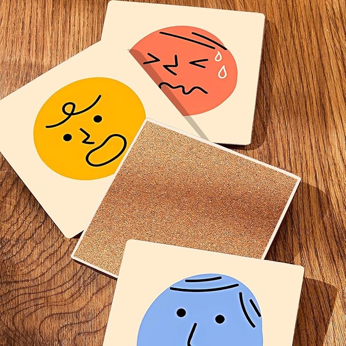 MAYCARI Cartoon Emotional Face Coasters Set of 6 Cork Backed Cute Coasters with Metal Holder Original Ceramic Surface Drink Cup Mats for Tabletop Protection Modern Desk Decoration Birthday Gifts