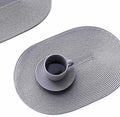 FunWheat Oval Braided Placemats Set of 4 Table Mats for Dining Tables Washable Heat Resistant Place Mats for Indoor Outdoor Use 12 x18 Inch(Oval Light Grey, 4pcs)