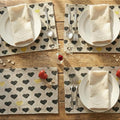 DaDa Bedding Woven Tapestry Heart Placemats – Set of 4 – Black & Gold Heart Pattern Table Mats for Dining Room – Rustic Farmhouse Valentine’s Day Decor & Everyday Kitchen Table Setting – 13" x 19"