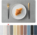 Jovono Faux Leather Placemats Set of 8, Waterproof Washable Table Mats, Easy-Clean Heat Resistant Kitchen Vinyl Place Mat for Dining Table, Restaurant, Indoor, 17.8"x11.8", Light Gray